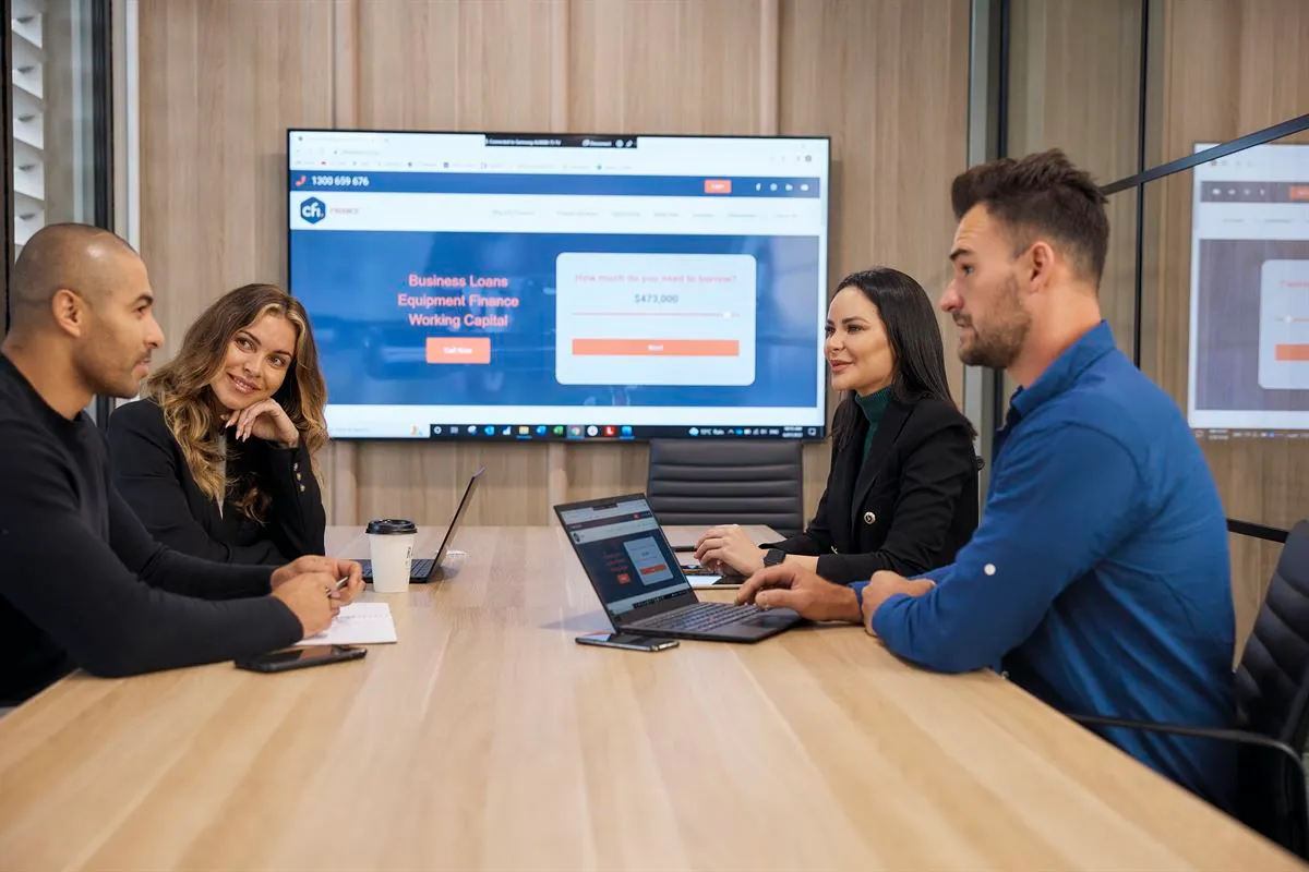 Professional advisors meeting around a table